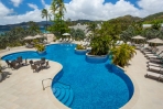 Spice Island Beach Resort: Poollandschaft mit Sitzgelegenheit