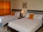 Grooms Beach Resort: Chambre avec deux lits