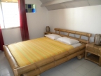 Schlafzimmer eines ebenerdigen Apartments (Wohnbeispiel)